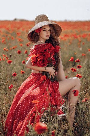 195586679-fashion-outdoor-photo-of-beautiful-woman-with-dark-hair-in-elegant-red-dress-and-straw-hat-posing-in.jpg